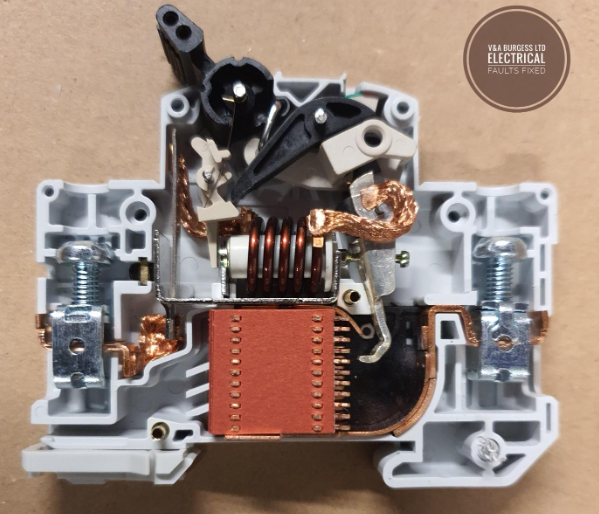 Inside a Circuit Breaker Trip Switch showing metal parts -Electrical Faults Fixed