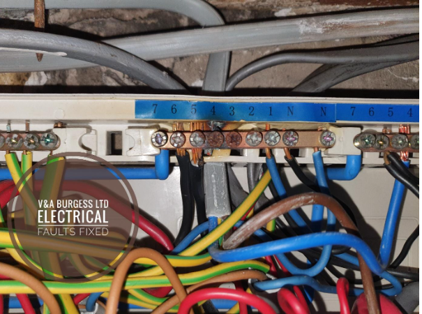 Burnt out wiring in a Consumer Unit found on an EICR - Electrical Faults Fixed