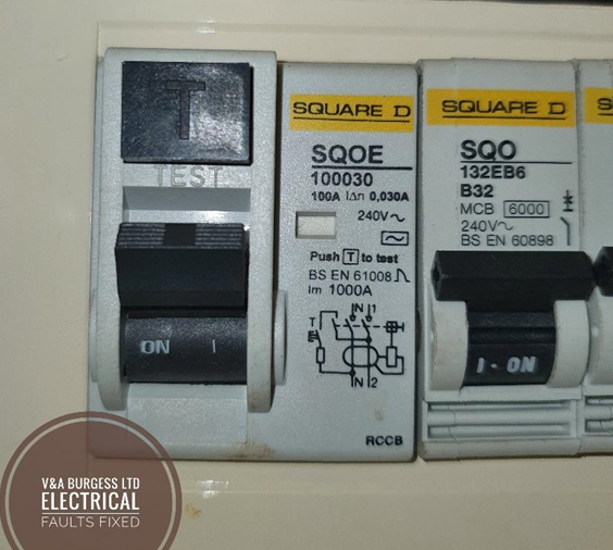 An RCD with test button next to a circuit breaker